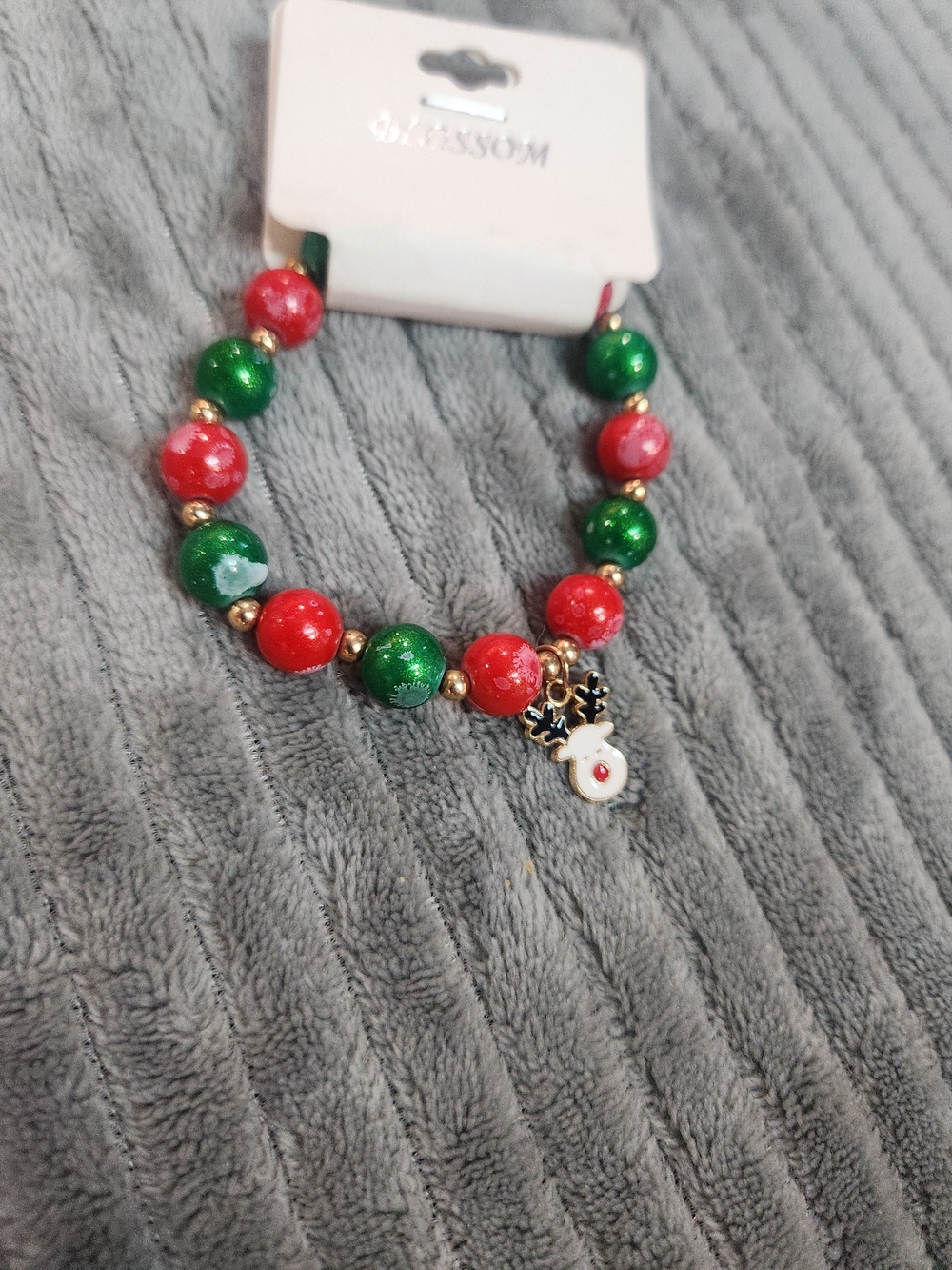 Blossom Christmas beaded stretch bracelet featuring red green glitter beads